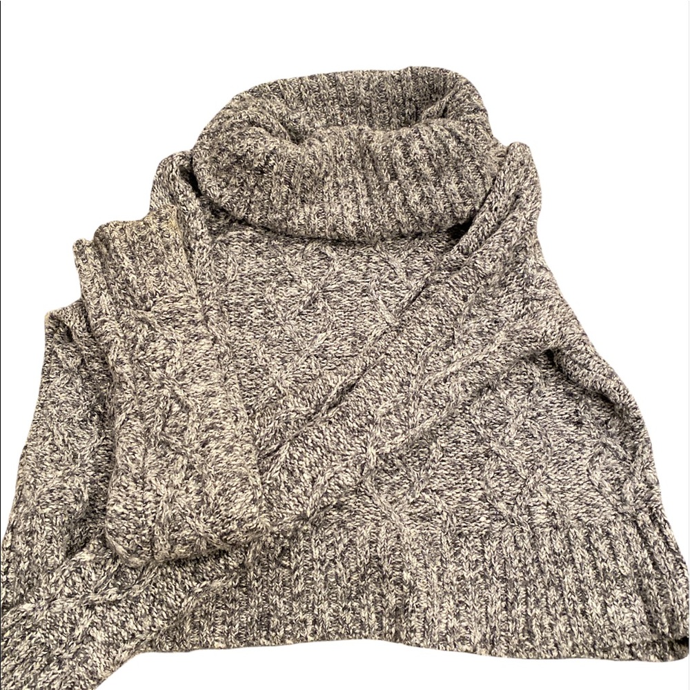 One of my fave sweaters. Turtle neck and cropped. Darker than looks in picture